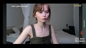 Shy Young Girl Playfully Flirting On Cam
