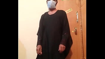 Guy In Pakistan Enjoying Himself In A Black Gown With Some Dance Moves