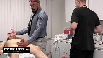 Muscular Doctor And Young Assistant Give Special Anal Treatment To Attractive Patient