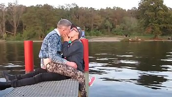 Two Men Share A Passionate Kiss Outdoors