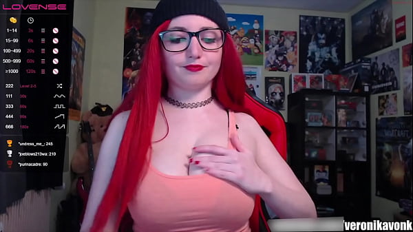 Flirty Redhead In Tiny Shorts