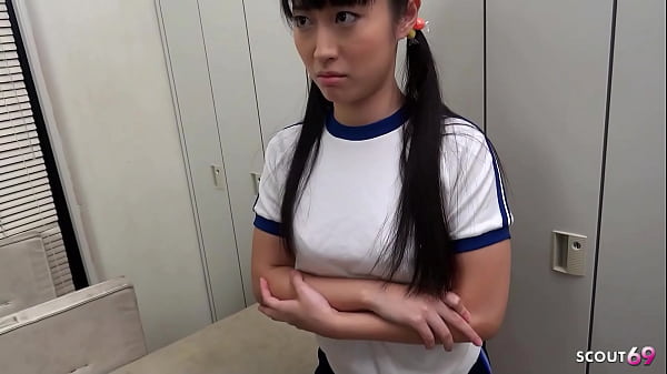 Tiny Asian Schoolgirl Gets Coaxed Into Her First Mouthful By A Classmate