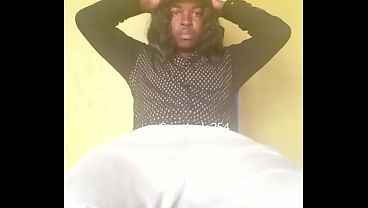 Naughty Crossdresser Stroking A Huge Black Cock Until It Explodes.